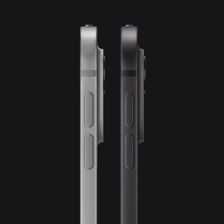 Two iPad Pro devices, side exterior, portrait orientation, silver color and space black color, volume-up button, volume-down button, rounded corners, straight edges, raised pro camera system